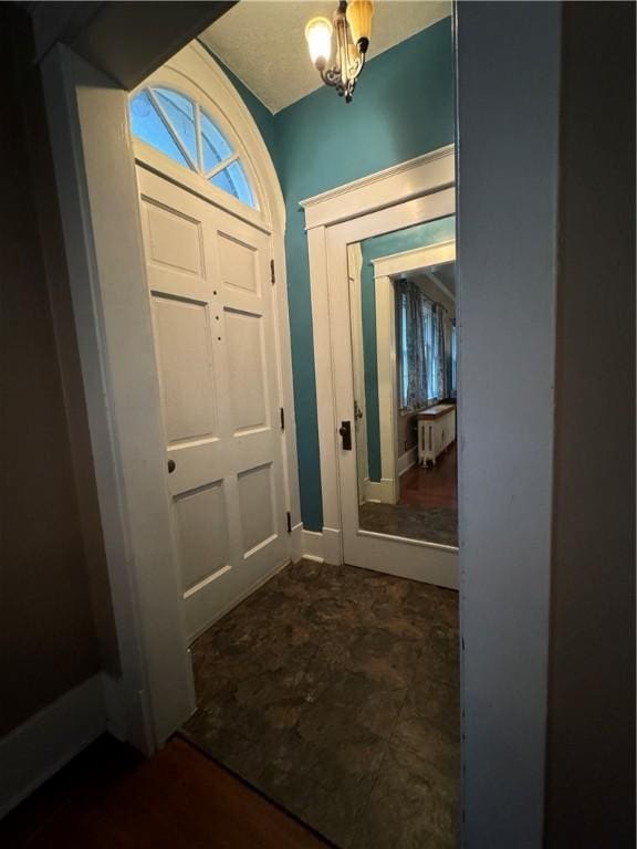 entrance foyer with an inviting chandelier