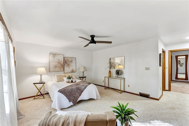 bedroom featuring ceiling fan and carpet floors