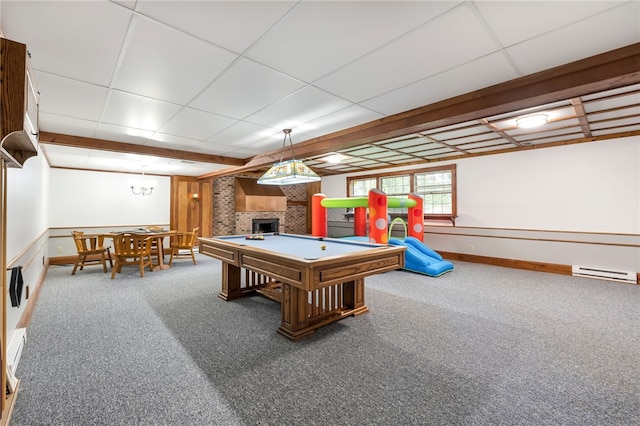 playroom featuring a paneled ceiling, a baseboard heating unit, a large fireplace, carpet floors, and billiards