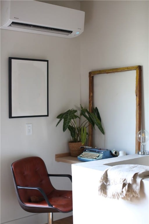 office space featuring a wall unit AC