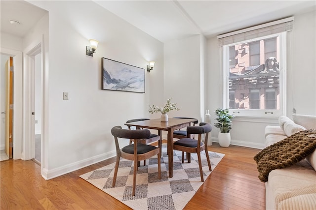 dining room with light wood-type flooring