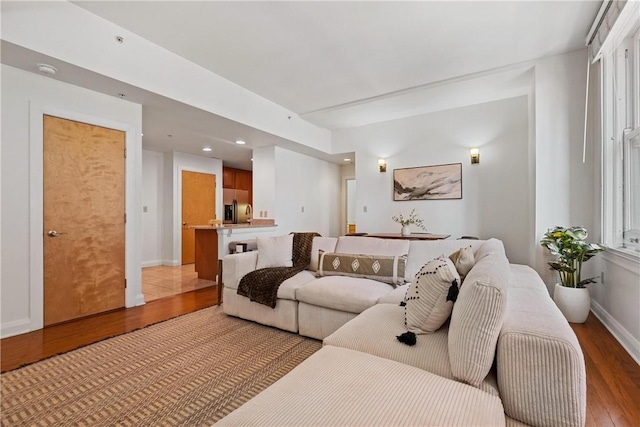 306 4th Ave Unit 501, Downtown Pgh, PA 15222 - living area with light wood-style flooring and recessed lighting