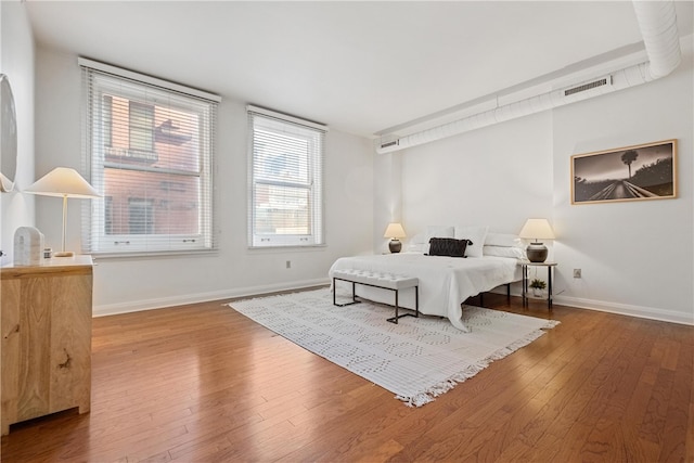 bedroom featuring hardwood / wood-style floors