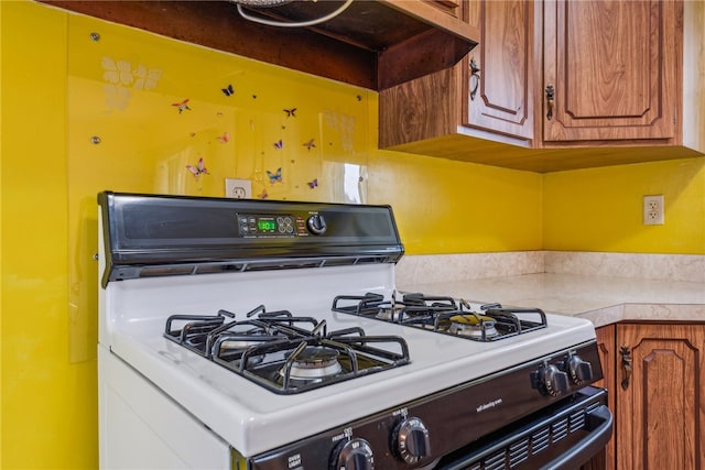 kitchen featuring white gas range oven