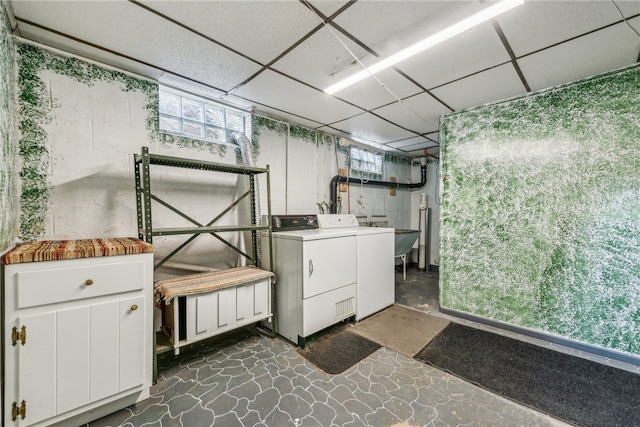 clothes washing area featuring washer and dryer