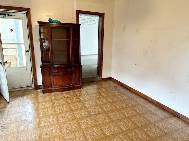 unfurnished bedroom featuring light parquet floors