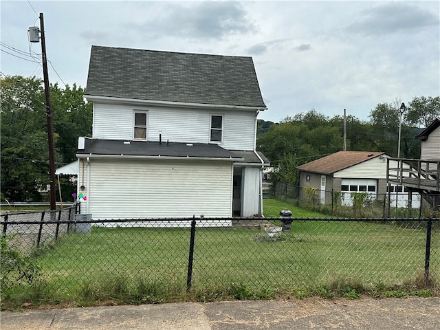 view of property exterior featuring a lawn