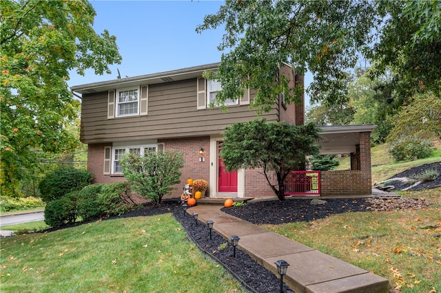 view of front of property with a front lawn