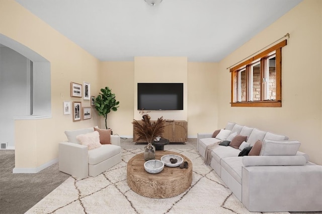 living room featuring light colored carpet