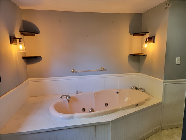 bathroom featuring a relaxing tiled tub