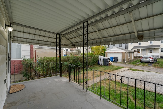 exterior space with an outdoor structure and a garage