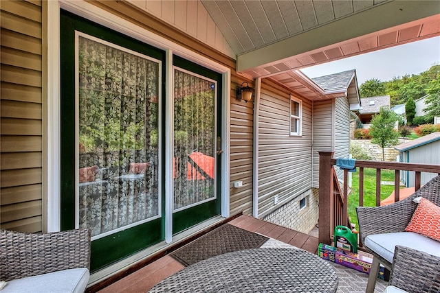 wooden balcony with a wooden deck