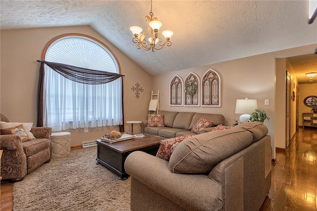 living room featuring a textured ceiling, wood-type flooring, vaulted ceiling, and an inviting chandelier