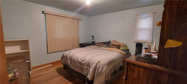 bedroom featuring light wood-type flooring