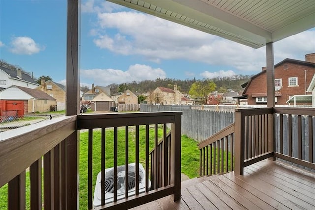 wooden deck with a yard