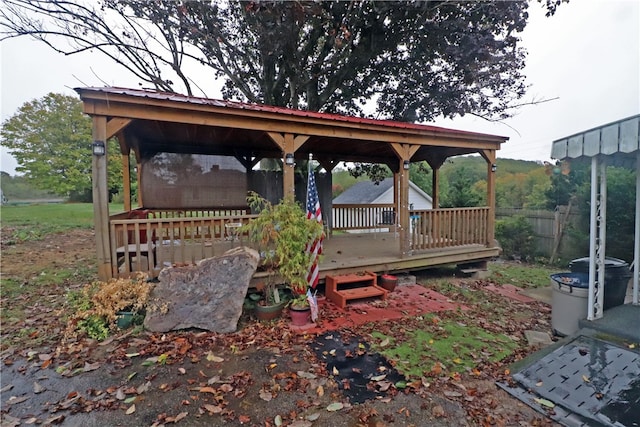 surrounding community featuring a wooden deck