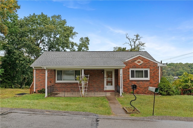 view of front of property with a front lawn