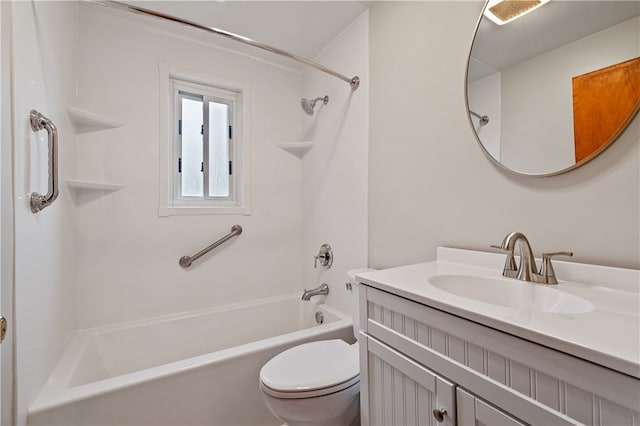 full bathroom with  shower combination, vanity, and toilet