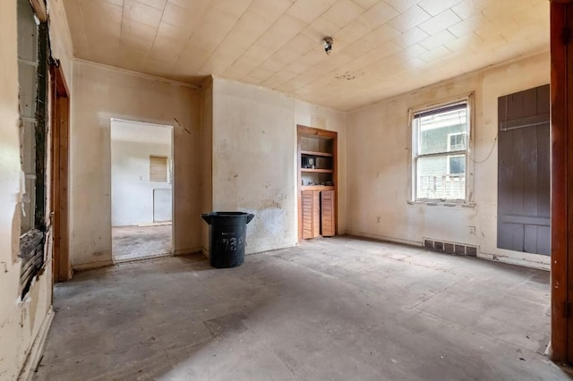 373 Stewart St, Turtle Creek, PA 15145 - unfurnished living room with concrete floors