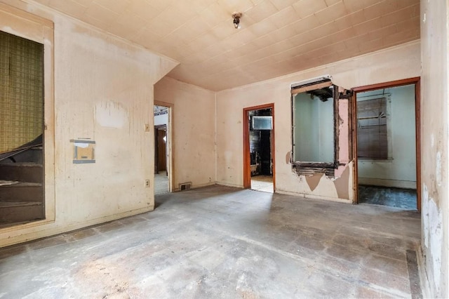 373 Stewart St, Turtle Creek, PA 15145 - unfurnished room with unfinished concrete floors and crown molding