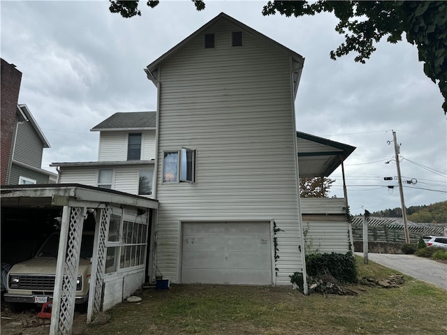 view of property exterior with a garage