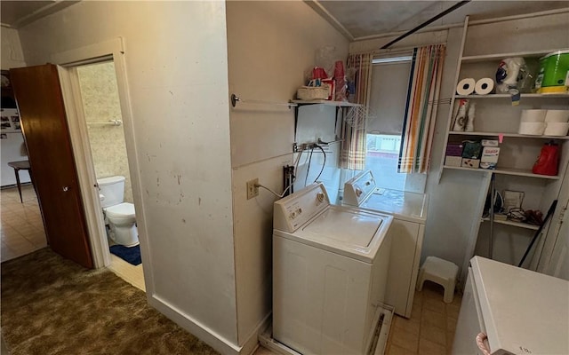 laundry area with laundry area and washing machine and clothes dryer