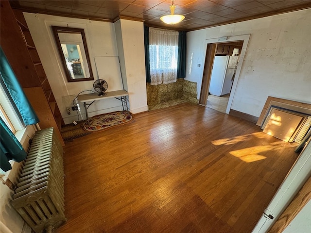 unfurnished room featuring hardwood / wood-style flooring