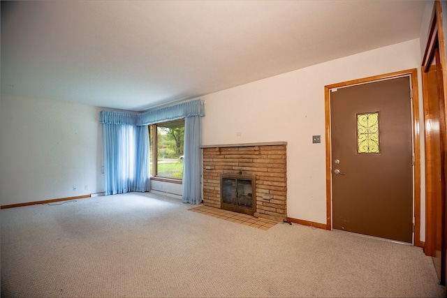 unfurnished living room featuring light colored carpet