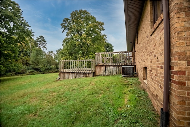 view of yard with central AC unit