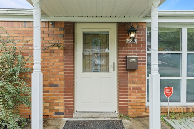 doorway to property with covered porch