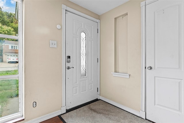 foyer entrance featuring a wealth of natural light