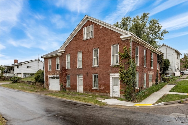 view of property exterior featuring a garage