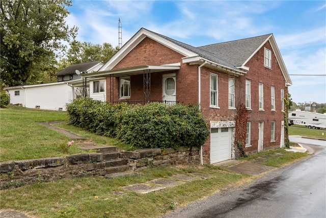 view of property exterior with a yard and a garage