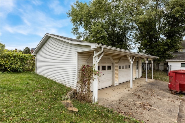 garage with a lawn