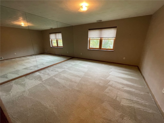 empty room featuring carpet