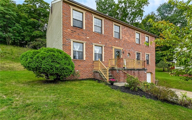 view of front of home with a front lawn