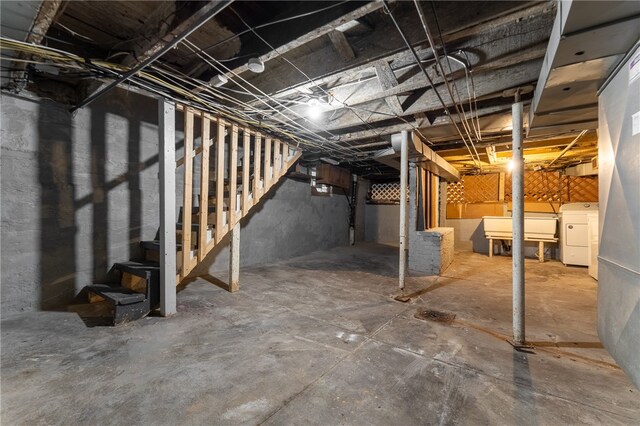 basement with washer and clothes dryer