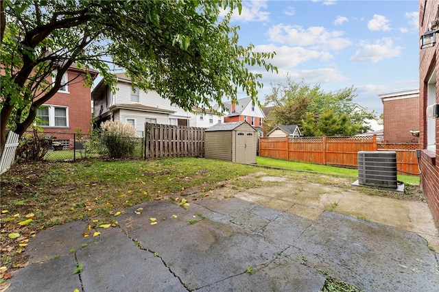 exterior space with a storage shed and central air condition unit