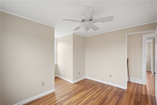 unfurnished room featuring ceiling fan, hardwood / wood-style flooring, and crown molding