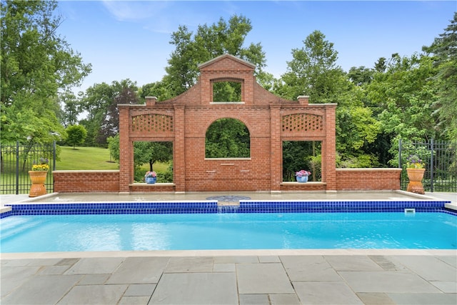 view of swimming pool with a patio