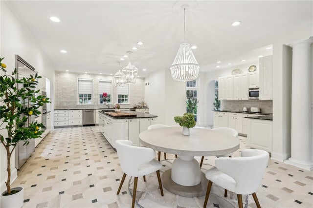 dining room with a notable chandelier