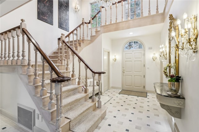 entryway featuring a high ceiling