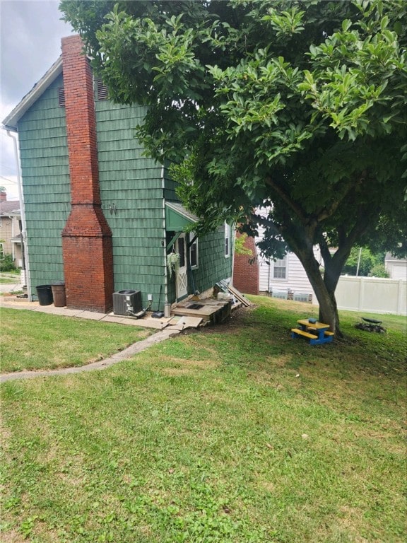 view of yard featuring cooling unit