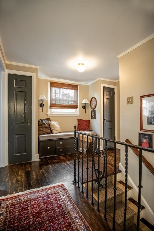 interior space featuring dark wood-type flooring and crown molding