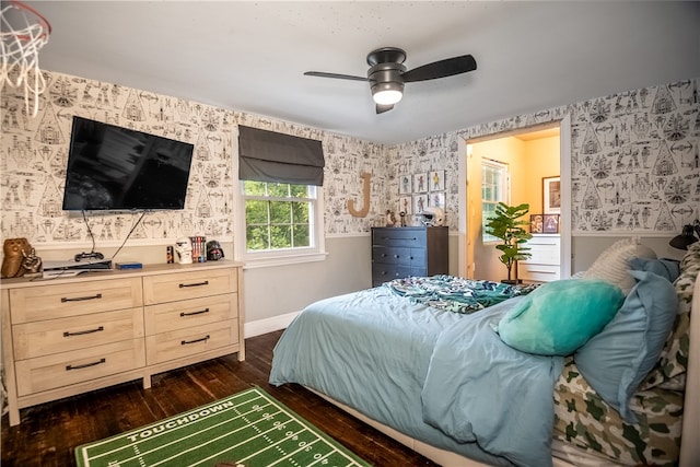 bedroom featuring ceiling fan and dark wood-type flooring