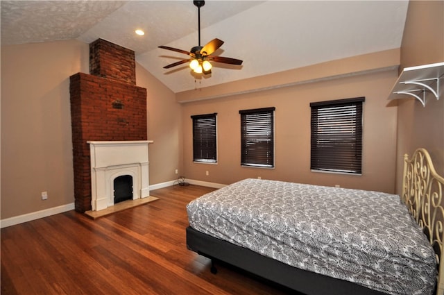 bedroom featuring lofted ceiling, ceiling fan, and hardwood / wood-style floors