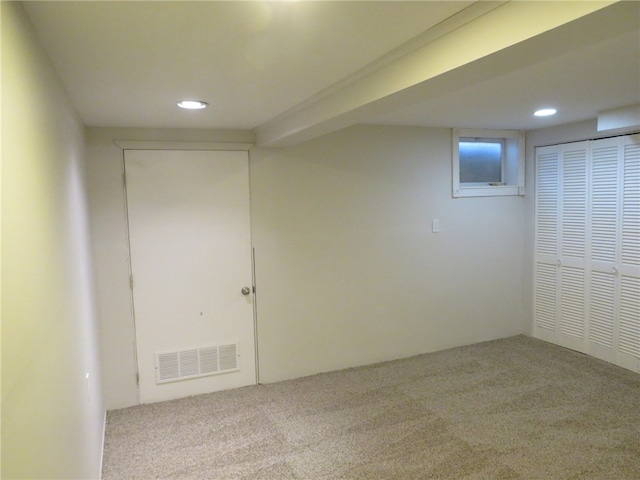 basement with light carpet