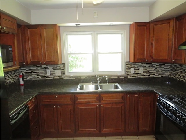 kitchen featuring backsplash, black appliances, sink, and light tile patterned floors