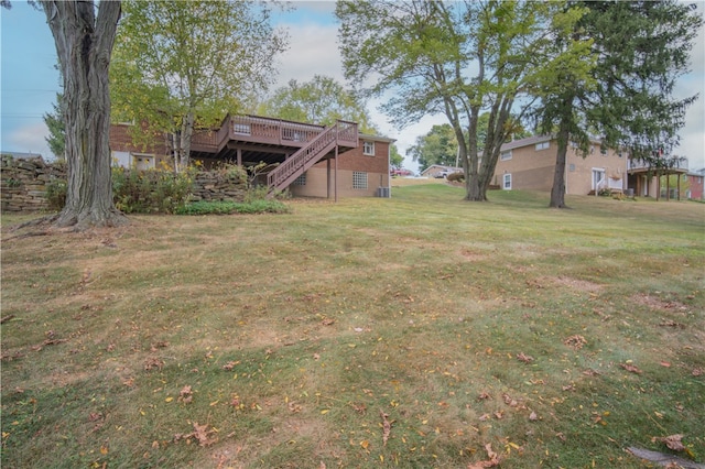 view of yard with a wooden deck