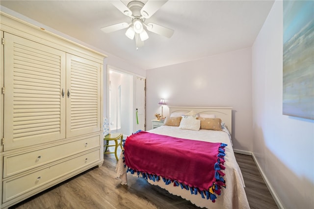 bedroom featuring ceiling fan and hardwood / wood-style flooring